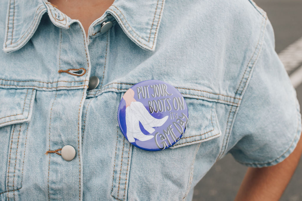Put Your Boots On It's Gameday Button-Purple